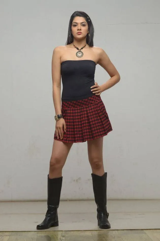 Sakshi Chaudhary long Legs Stills In Maroon Mini Skirt